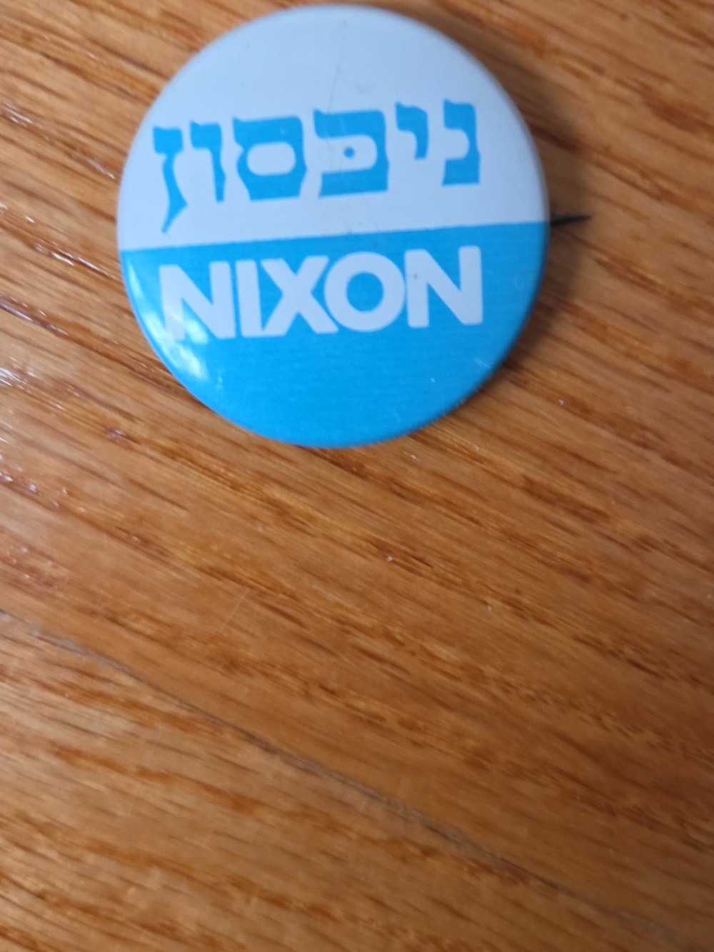 Nixon Blue and White Logo Pin